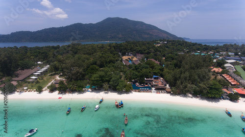 Bird’s eye view of tropical beach and rocky coast with crystal clear turquoise water on Thai island, pattaya beach,Koh Lipe