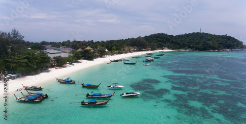 Bird’s eye view of tropical beach and rocky coast with crystal clear turquoise water on Thai island, pattaya beach,Koh Lipe