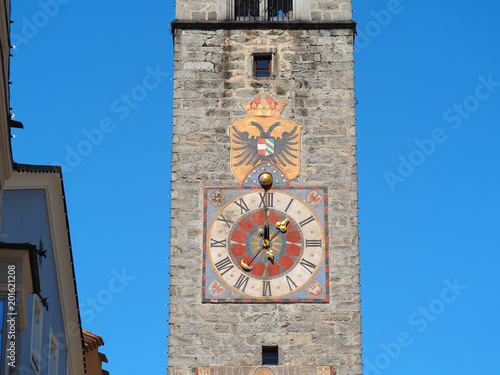 Vipiteno, Bolzano, Trentino Alto Adige. The tower of the Twelve in the pedestrian street of the village photo