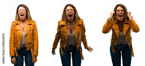Beautiful young woman stressful, terrified in panic, shouting exasperated and frustrated. Unpleasant gesture. Annoying work drives me crazy over white background