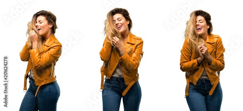Beautiful young woman confident and happy with a big natural smile laughing over white background
