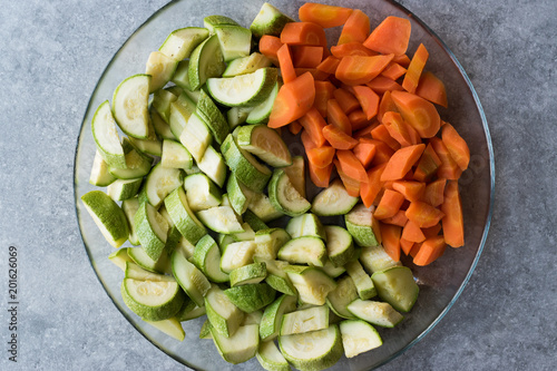Chopped Zucchini and Carrot Slices in Glass Bowl.