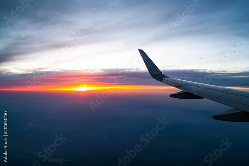 Plane travel, beautiful sunset, world travel