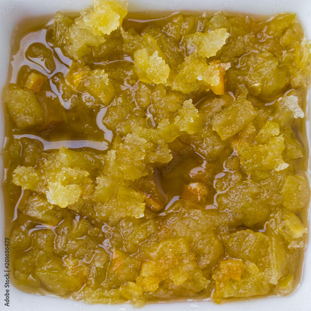 Fruit jam in a food container close-up Fruit jam in a food container close-up