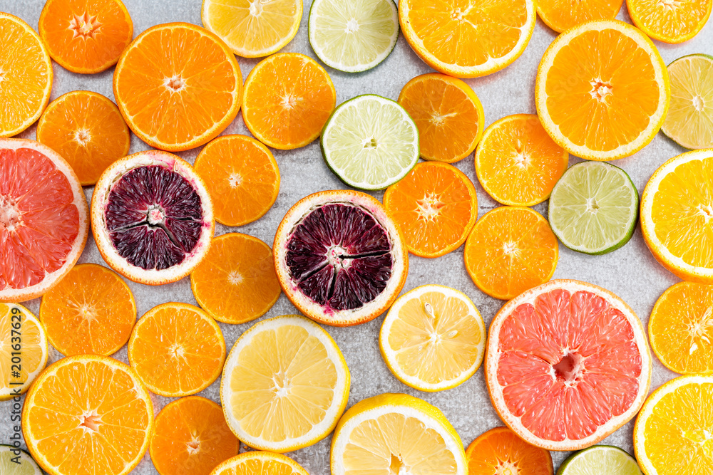 Colorful fresh cut citrus fruit background Colorful fresh cut citrus fruit background