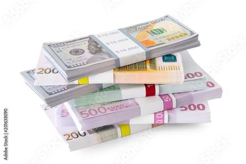 Pile of money - dollar and euro banknotes on white.