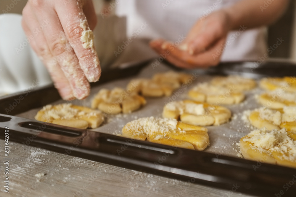 female woman artisan baker at home baking a sweet dough cookies, series from the whole process available female woman artisan baker at home baking a sweet dough cookies, series from the whole process available