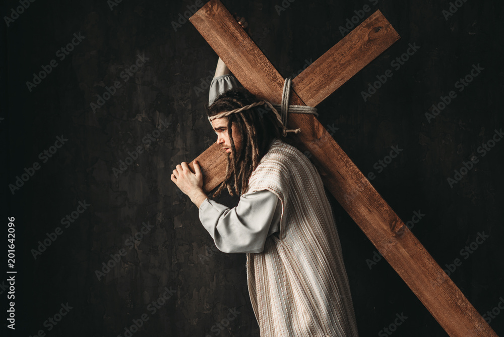 Great martyr with cross, black background Great martyr with cross, black background