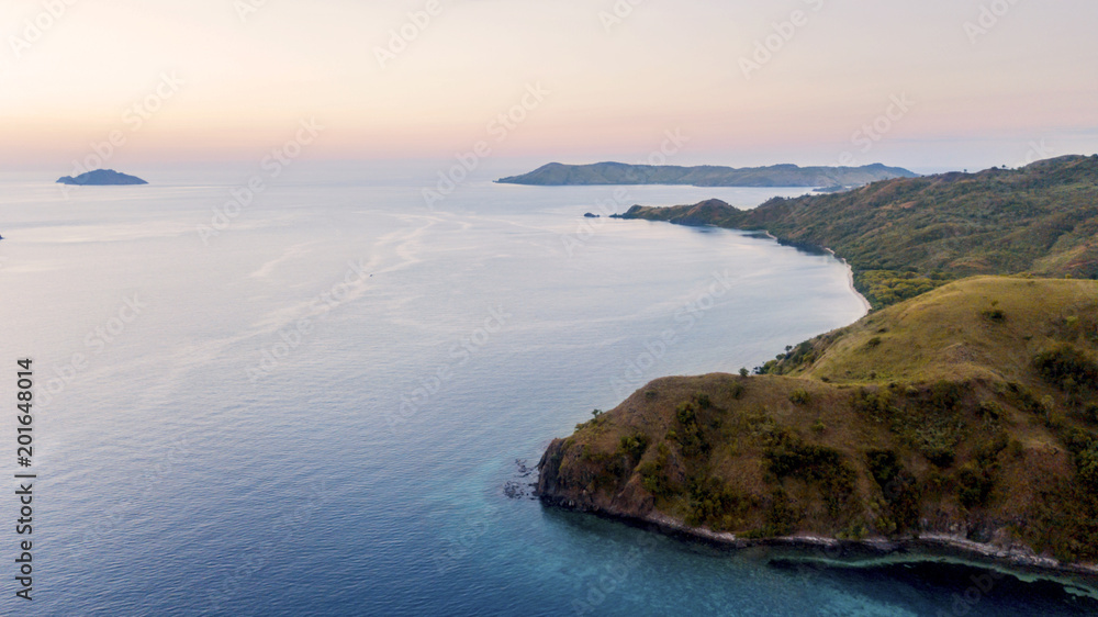 Exotic Padar island at sunset time