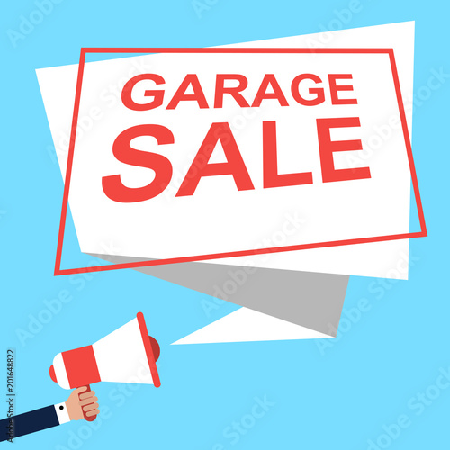 Hand Holding Megaphone With Speech GARAGE SALE. Announcement. Vector illustration