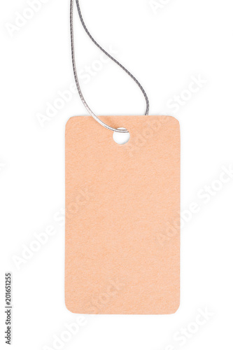 Brown craft cardboard tag with silver rope isolated