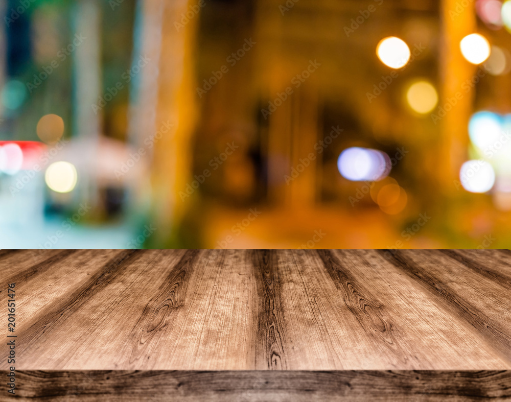 Wooden empty table board in front of blurred background. Can be used for display or montage any product. Mock up for display your product. Wooden empty table board in front of blurred background. Can be used for display or montage any product. Mock up for display your product.