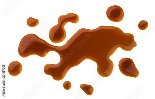 Splashes and spilled soy sauce isolated on white background. Top view