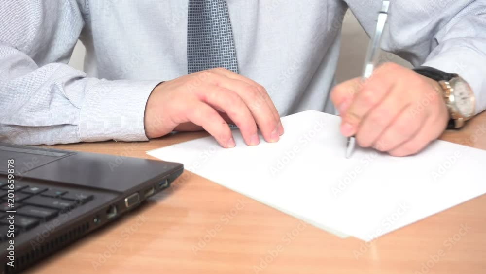 Businessman working at the desk Businessman working at the desk