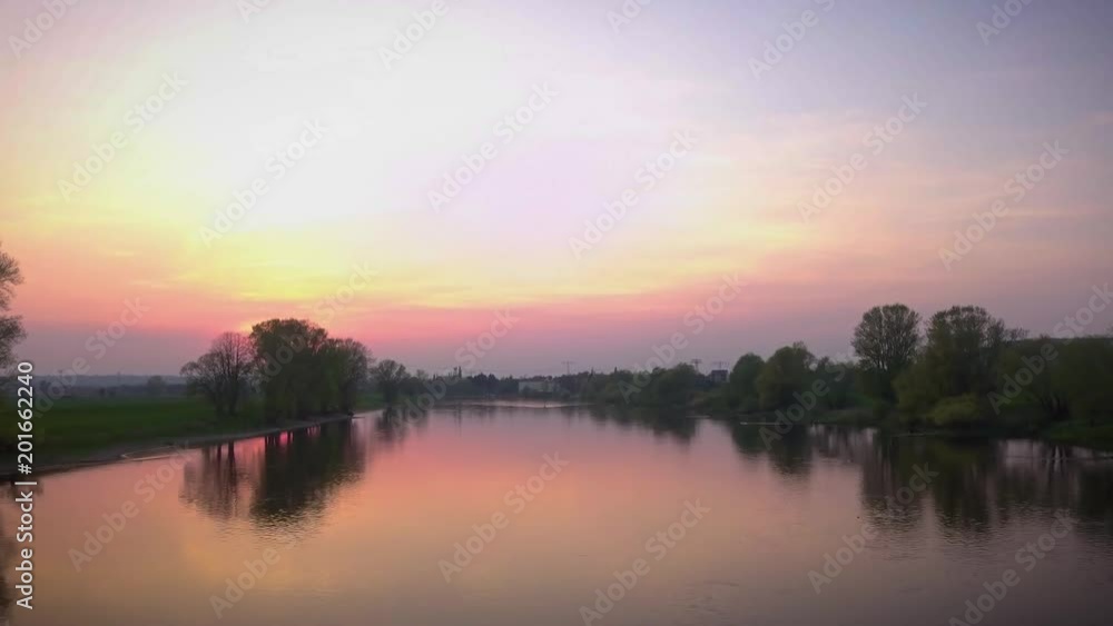 sunset over the river sunset over the river