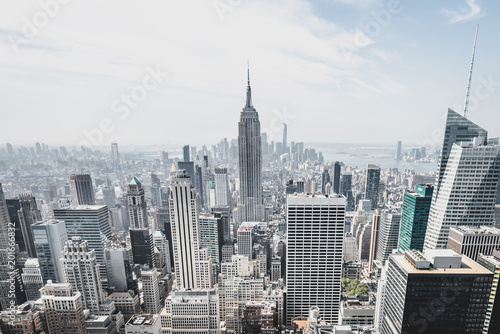 View from rockefeller center plattform over big apple new york city at a light cloudy day with blue sky, New York City, New York/ USA - August-21-2017 © Thomas Jastram