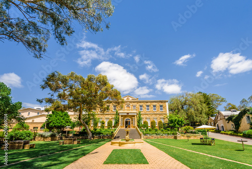 Obraz na płótnie Wonderful green spring summer view to an old vineyard building situated in wine grape valley of the great ocean road with golden well, Barossa Valley, Chateau Yaldara, South/ Australia - 10 19 2017 w salonie