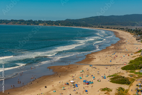 People at the beach on the pacific coastline