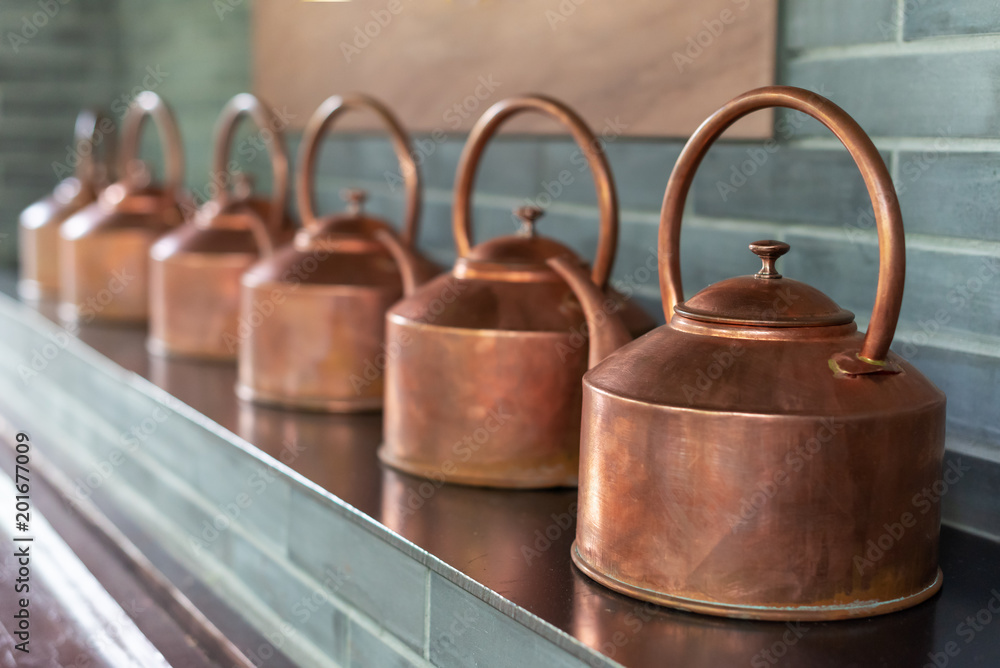 Copper teapots in a row in Chengdu, China Copper teapots in a row in Chengdu, China