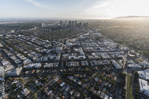 Afternoon aerial view of Beverly Hills and Century City buildings and streets in Los Angeles, California.  