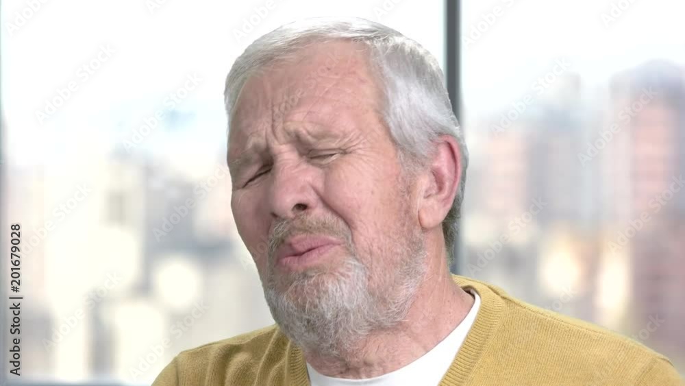 Aged man suffers from heart arrest. Sick senior man close up. Causes of breath shortness. Aged man suffers from heart arrest. Sick senior man close up. Causes of breath shortness.