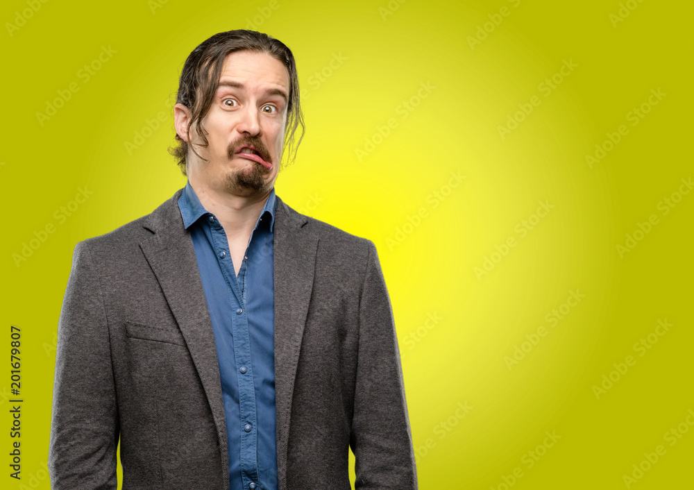 Handsome young man doubt expression, confuse and wonder concept, uncertain future Handsome young man doubt expression, confuse and wonder concept, uncertain future
