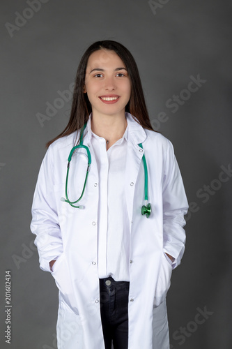 Beautiful smiling Turkish female doctor woman with self confident pose
