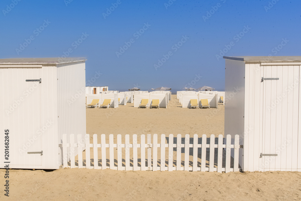Bath huts and deckchairs on a beach of the North Sea, in Belgium
Bath huts and deckchairs on a beach of the North Sea, in Belgium
