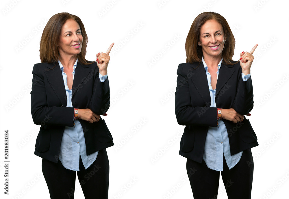 Middle age business woman pointing away side with his finger over white background Middle age business woman pointing away side with his finger over white background