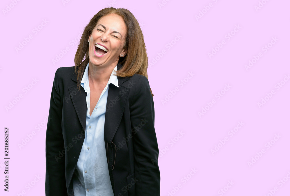 Middle age business woman confident and happy with a big natural smile laughing Middle age business woman confident and happy with a big natural smile laughing