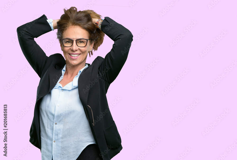 Middle age business woman confident and happy with a big natural smile Middle age business woman confident and happy with a big natural smile