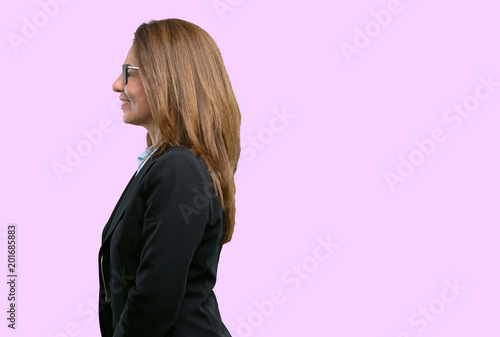 Middle age business woman side view portrait © Krakenimages.com