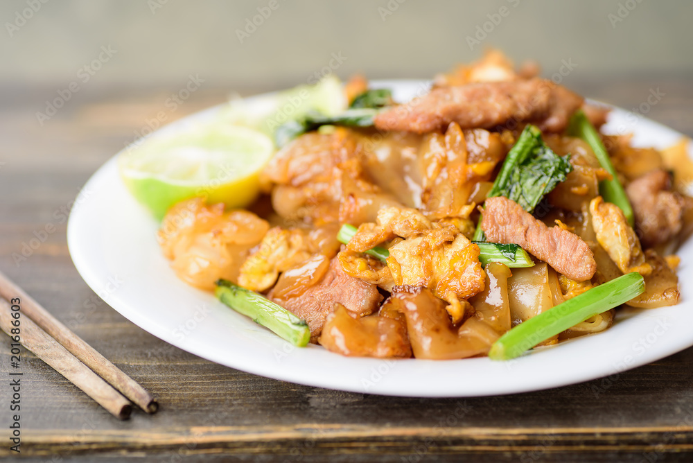 Thai food, stir fried rice noodles in soy sauce (Pad See Ew)