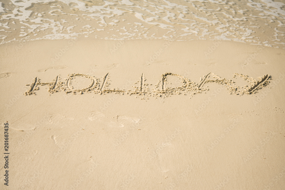 Fototapeta premium The inscription on the sand 