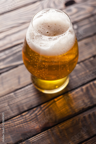Small glass of light beer