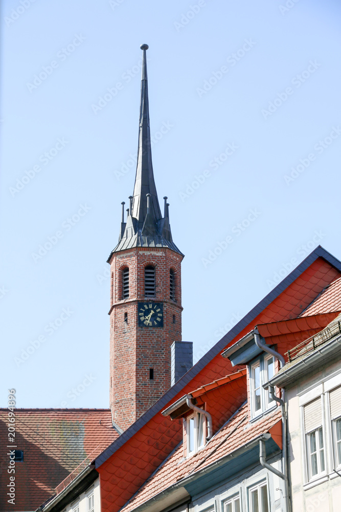 Salzwedel, Germany - April 20, 2018: View of the tower of the Lorenzkirche in Salzwedel, Germany. Salzwedel, Germany - April 20, 2018: View of the tower of the Lorenzkirche in Salzwedel, Germany.