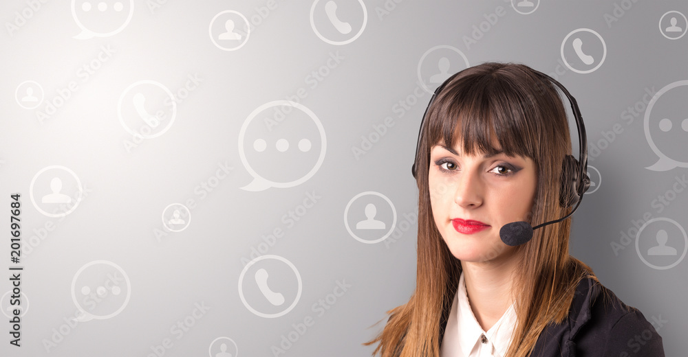 Young female telemarketer with white speech bubbles around her Young female telemarketer with white speech bubbles around her