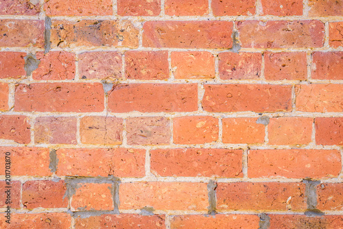 Old house sandstone brick wall made with red orange stone, vintage texture block background