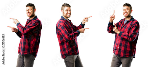 Young man pointing away side with finger isolated over white background, collage composition