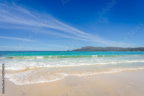 Amazing view to great paradise island sandy beach with turquoise blue water and green shore jungle forest on warm sunny clear sky relaxing day  River Adventure Bay  Bruny Island  Tasmania  Australia