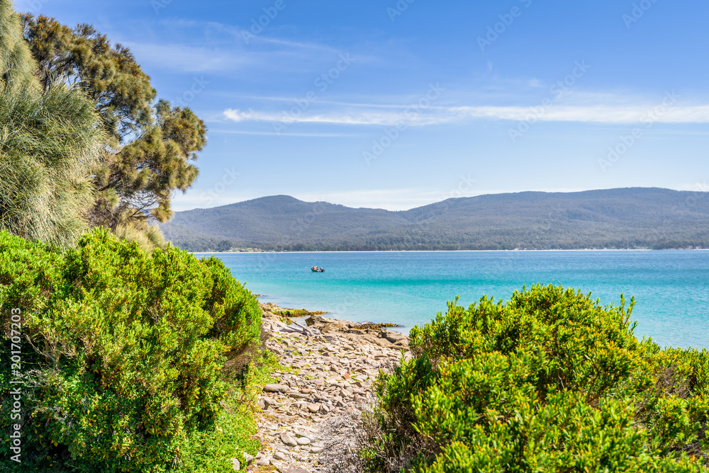 Amazing view to great paradise island sandy beach with turquoise blue water and green shore jungle forest on warm sunny clear sky relaxing day, Fluted Cape Track Bay, Bruny Island, Tasmania, Australia Amazing view to great paradise island sandy beach with turquoise blue water and green shore jungle forest on warm sunny clear sky relaxing day, Fluted Cape Track Bay, Bruny Island, Tasmania, Australia