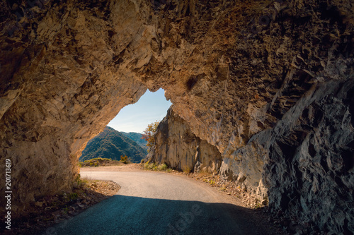 Driving through old tunnel in remote part of Montenegro