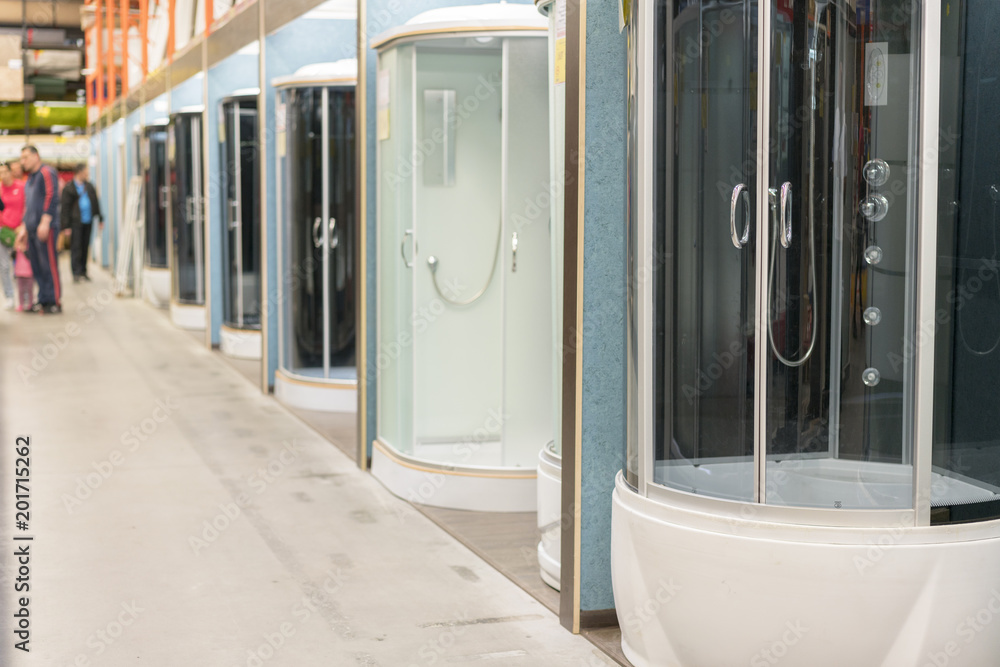 Shower cabins in the sanitary ware shop. inside HomePro store. The store provide advice and facilities for installation and maintenance of a wide range of domestic features. Shower cabins in the sanitary ware shop. inside HomePro store. The store provide advice and facilities for installation and maintenance of a wide range of domestic features.