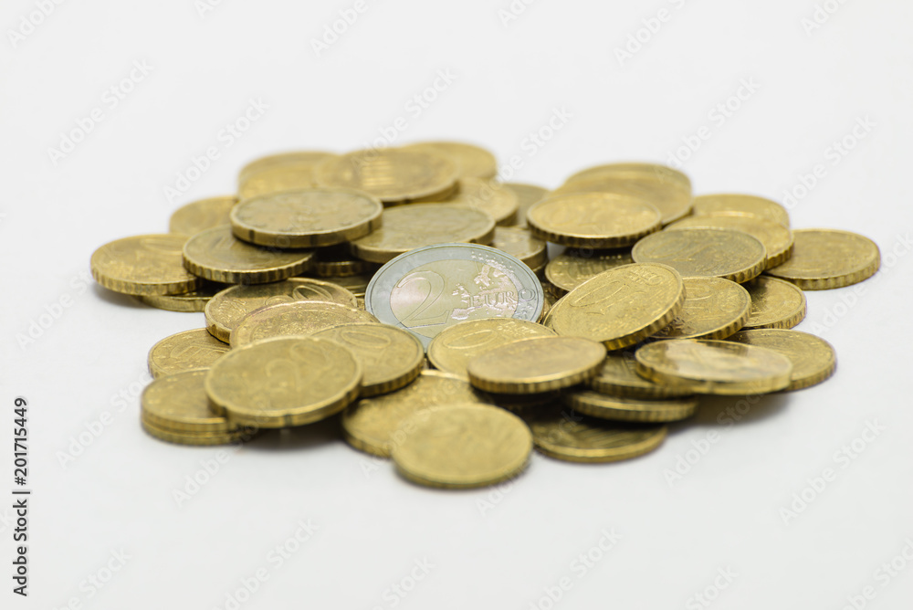 A pile of coins, the European currency EURO. Isolated on white background with clipping path. A pile of coins, the European currency EURO. Isolated on white background with clipping path.