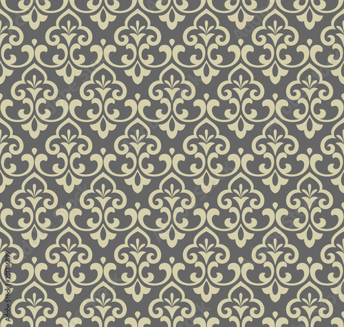 Wallpaper in the style of Baroque. A seamless vector background. Blue and gold floral ornament. Graphic vector pattern