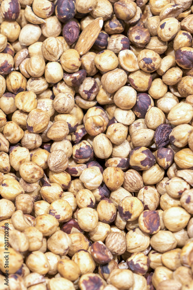 peeled hazelnuts close up, vegetarian food background peeled hazelnuts close up, vegetarian food background