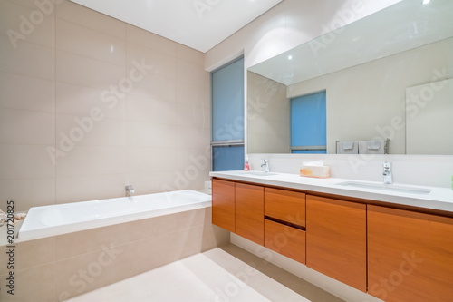 Large modern bathroom interior with luxury fittings.