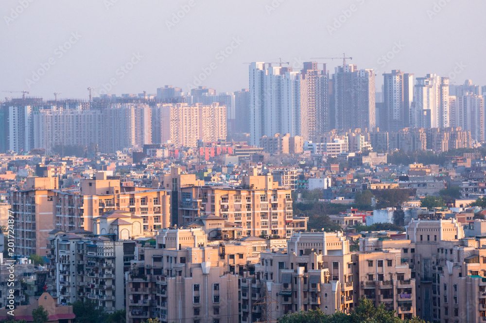 Cityscape in Noida, gurgaon, jaipur, delhi, lucknow, mumbai, bangalore, hyderabad showing small houses sky scrapers and other infrastructure options