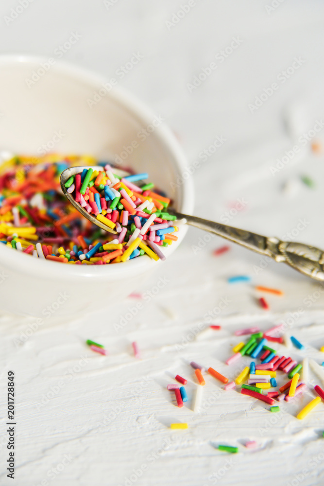 culinary sprinkling, cooking dressing in a Cup with a spoon on light background, close up culinary sprinkling, cooking dressing in a Cup with a spoon on light background, close up
