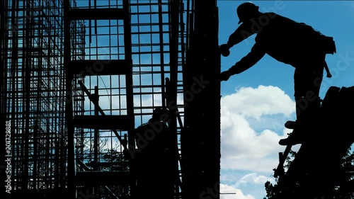 Worker Silhouette On The Construction Site 